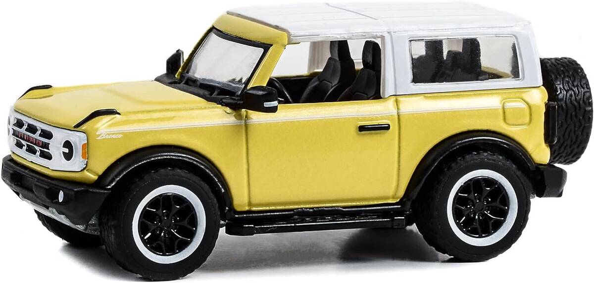 Greenlight 1/64 Showroom Floor Series 3- 2023 Bronco 2-Door Heritage Edition - Yellowstone Metallic con techo blanco Oxford 68030-D